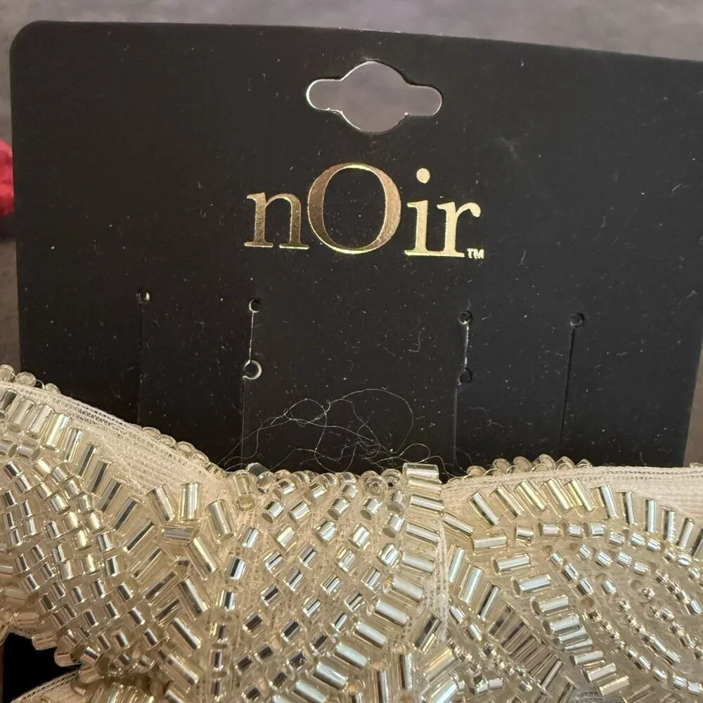 nOir Jewelry add romantic